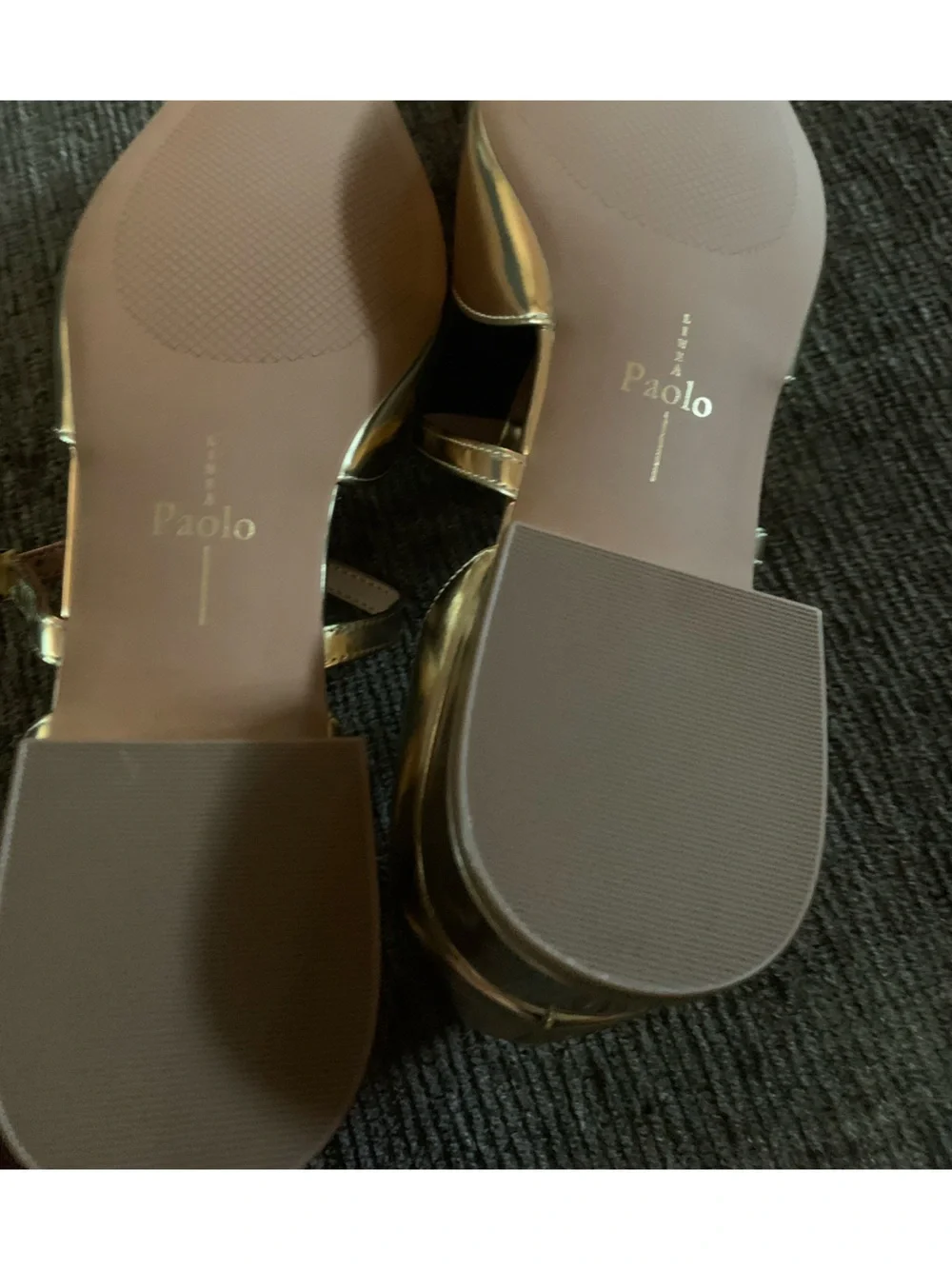 Linea Paolo Coralee Mary Jane pumps featuring a metallic gold finish.